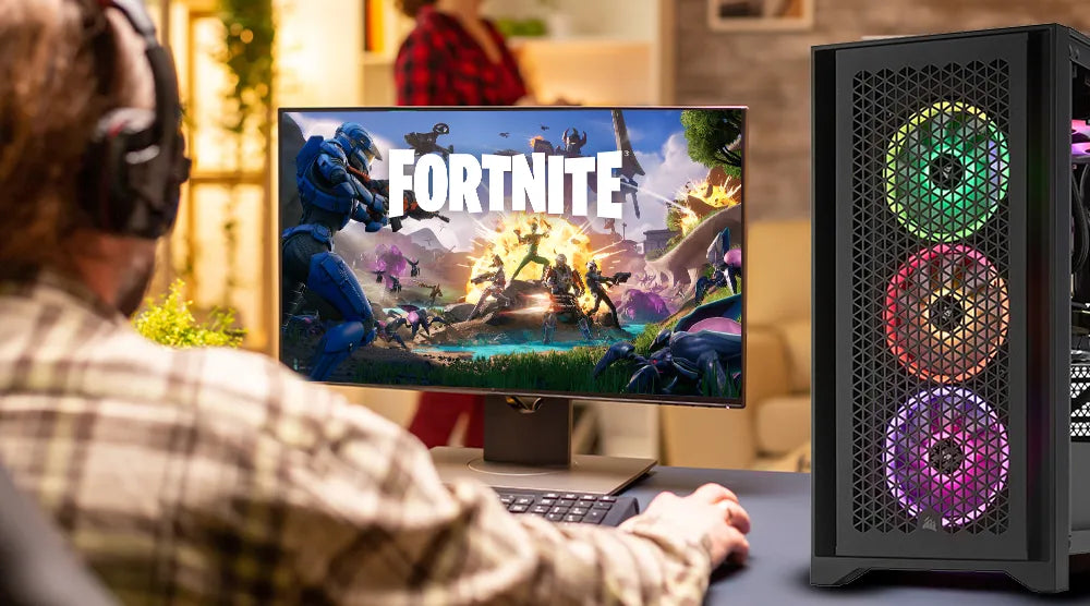 Player playing Fortnite on a PC with in-game action on screen